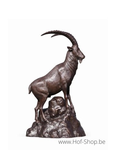 Chèvre de montagne à côté d'un rocher - statue en bronze (B1524)